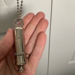 Falling whistle necklace